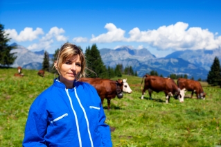 beautiful woman farmer in alpine mountain, France